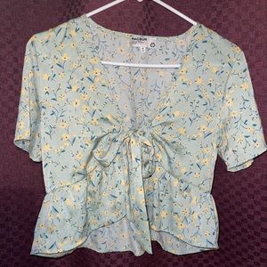 Light green top with flower design
